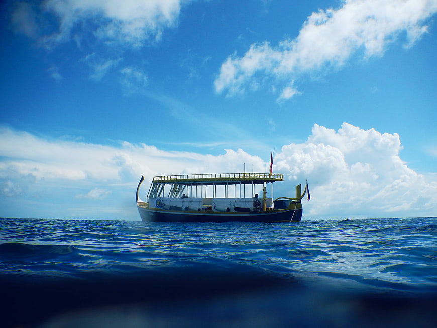 Traditional Thai Longtail Boat on Blue Ocean