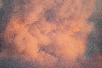 Soft Pink and Orange Clouds at Sunset