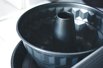 Close-up of dark metal bundt cake pan
