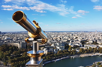 Golden Telescope Overlooking Paris Cityscape and Seine River
