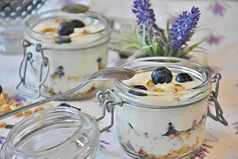 Yogurt Parfait with Blueberries and Granola in Glass Jars
