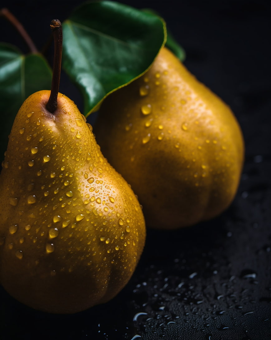 Fresh Golden Pears with Water Drops on Dark Background