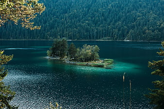 Serene Alpine Lake with Small Forested Island