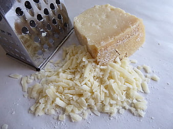 Grated Parmesan Cheese with Block and Metal Grater