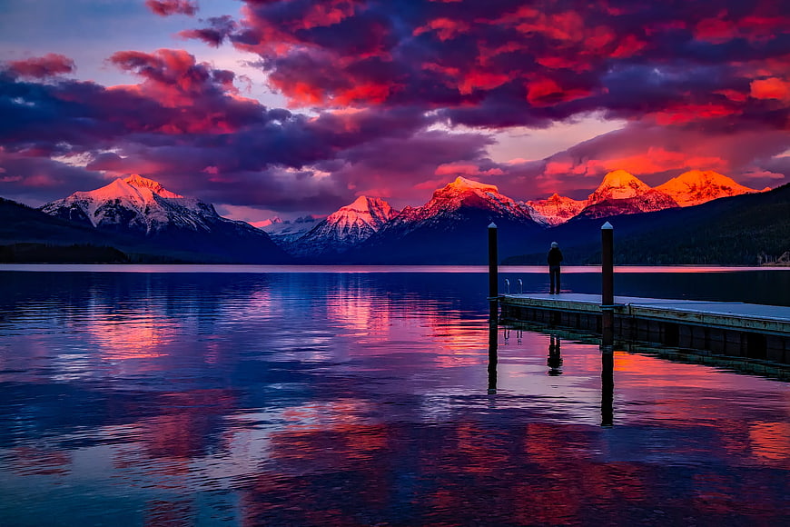 Dramatic Sunset Reflections on Lake McDonald with Mountains