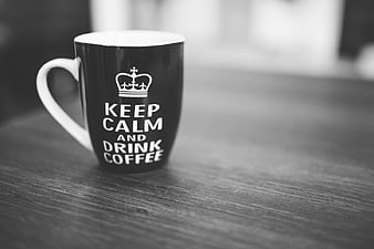 Black Keep Calm Coffee Mug on Wooden Table