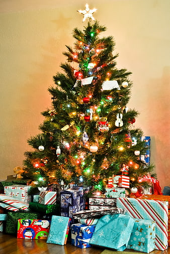 Decorated Christmas Tree with Gifts and Lights