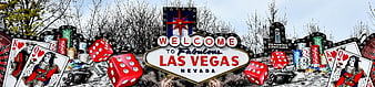 Las Vegas Welcome Sign With Casino Chips, Dice, And Playing Cards