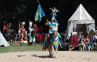 Medieval Knight On Horseback At Historical Tournament