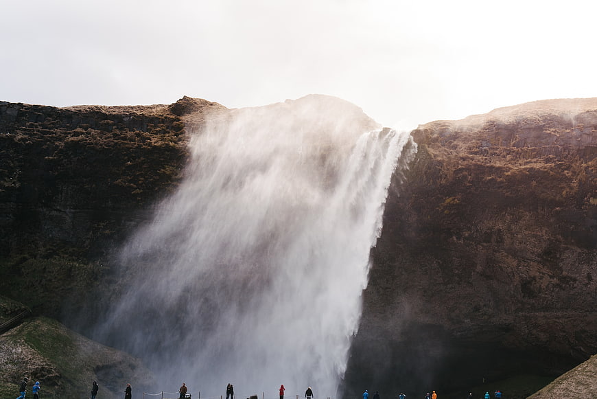 Majestic Skogafoss Waterfall in Iceland with Tourists