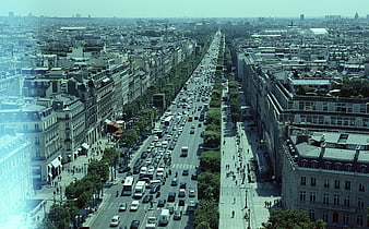 Vintage aerial view of busy Paris avenue with traffic