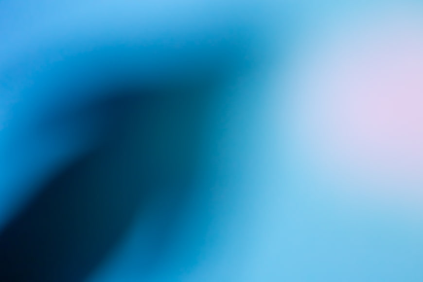 Abstract Blue Gradient Background with Soft Blurred Shapes