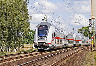 Silver and Red DB Train on Tracks