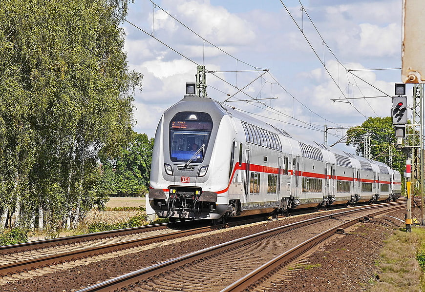 Silver and Red DB Train on Tracks