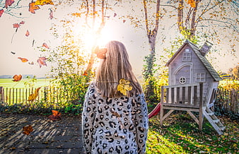 Girl in Leopard Sweater Watching Falling Autumn Leaves