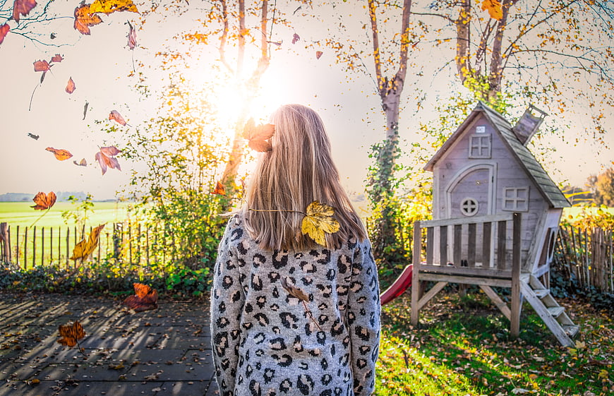 Girl in Leopard Sweater Watching Falling Autumn Leaves