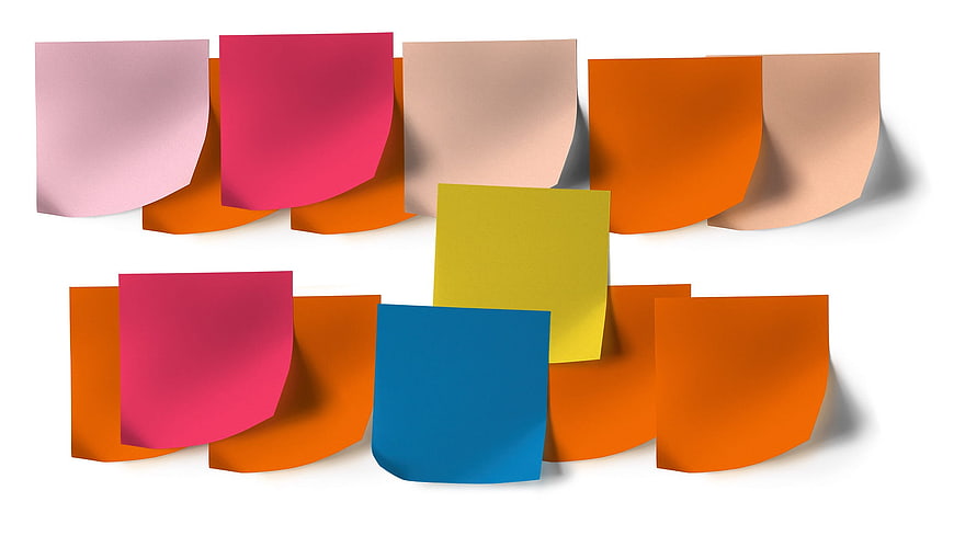 Colorful sticky notes on white background