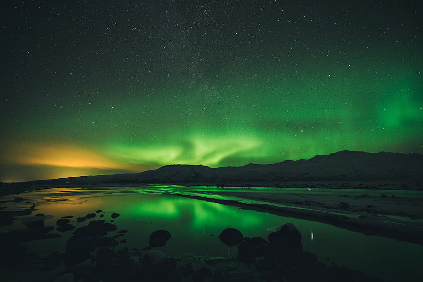 Aurora Borealis Reflecting in a River at Night