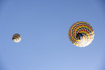 Colorful Hot Air Balloons Flying in Blue Sky