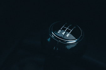 Manual Gear Shift Knob Close Up In Dark Car Interior