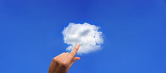 Hand Touching Cloud Concept for Cloud Computing