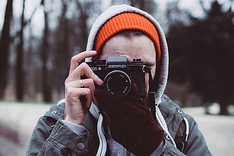 Man Photographer Holding Vintage Analog Camera