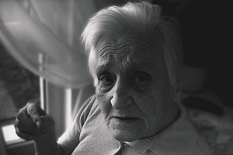 Black and white portrait of elderly woman with dementia