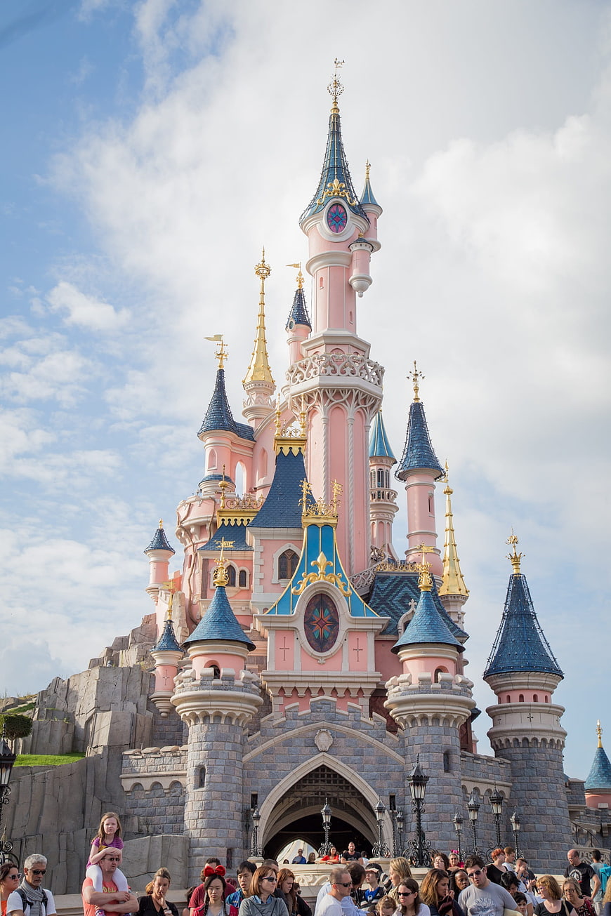 Cinderella Castle at Disneyland Paris with crowd of visitors