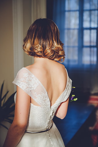 Bride in White Lace Wedding Dress Back View