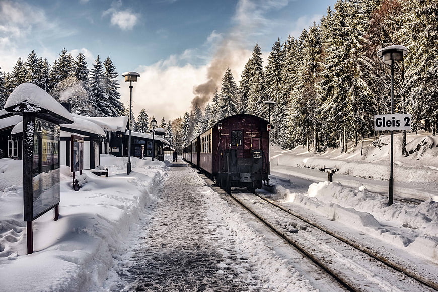 Vintage Steam Train at Snowy Winter Railway Station