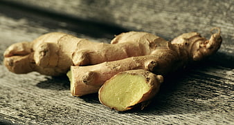Fresh Ginger Root on Rustic Wooden Table