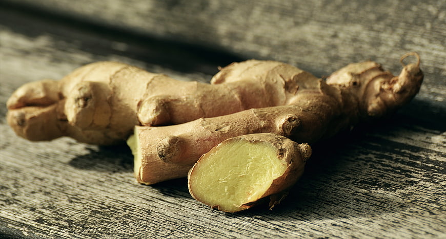 Fresh Ginger Root on Rustic Wooden Table