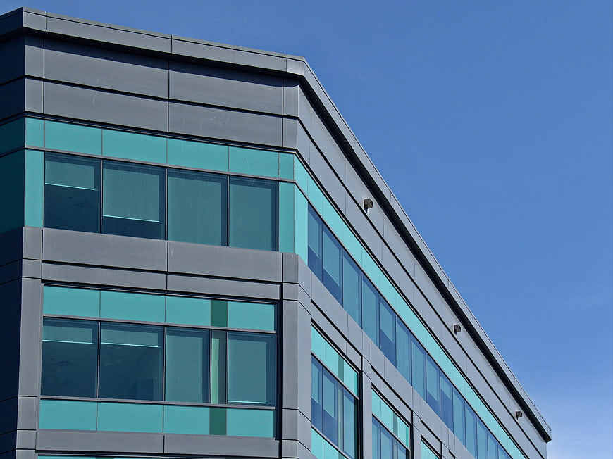 Modern Office Building Facade with Blue Glass Windows