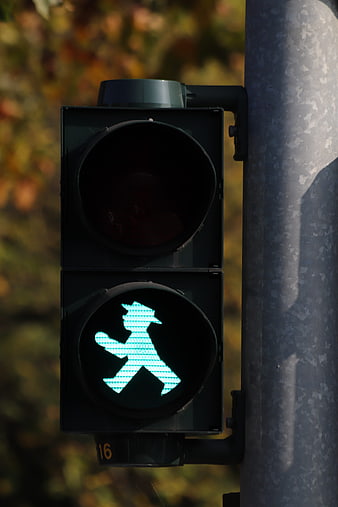 Green Pedestrian Traffic Light Signal with Running Man Icon