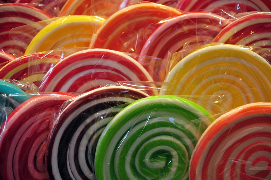 Colorful Swirl Lollipops in Plastic Wrappers