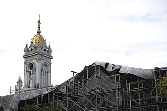 Church Tower Under Renovation with Scaffolding