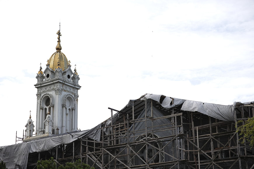 Church Tower Under Renovation with Scaffolding