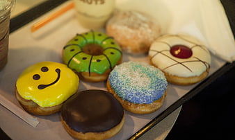 Assorted Colorful Donuts with Smile Face and Chocolate Glaze