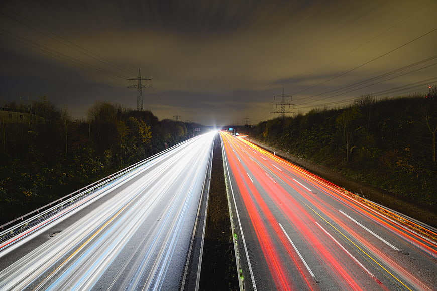 Long exposure light trails on a highway at night