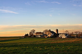 Rural Farmhouse Landscape at Golden Hour Sunset