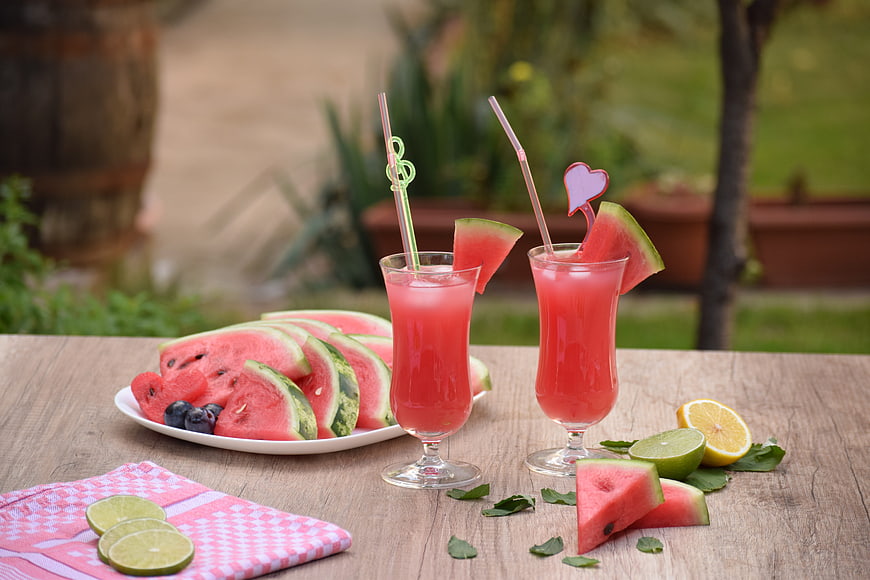 Refreshing Watermelon Smoothies on Wooden Table with Fruit
