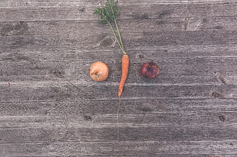 Fresh Carrot and Onions on Rustic Wooden Background