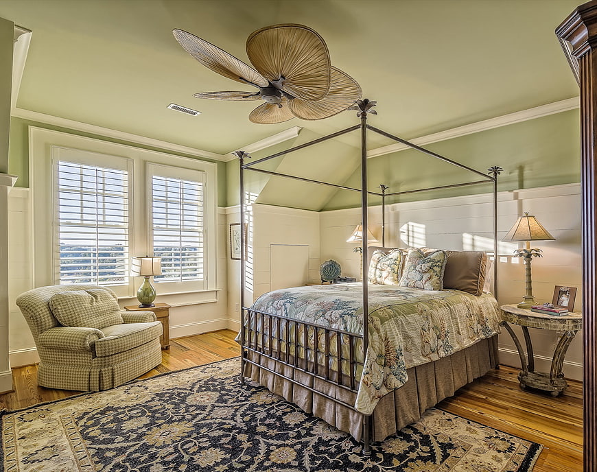 Cozy Bedroom Interior with Canopy Bed and Green Walls
