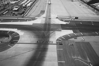 Aerial Black and White View of Airport Runway and Taxiway