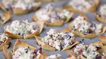 Crispy wonton cups filled with creamy chicken salad appetizer