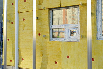 Building Facade Insulation With Mineral Wool And Window Frame