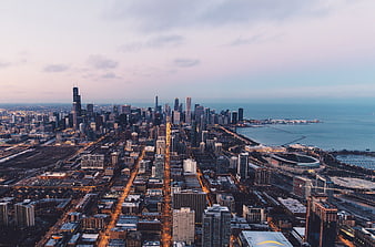 Aerial View of Chicago Skyline at Dusk with Lake Michigan