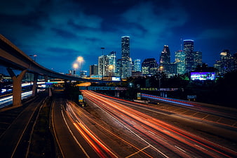 Houston skyline night long exposure highway traffic light trails