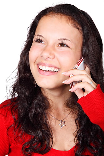 Happy Young Woman Talking on Smartphone