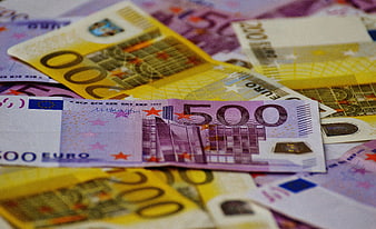 Close-up of scattered 500 and 200 Euro banknotes